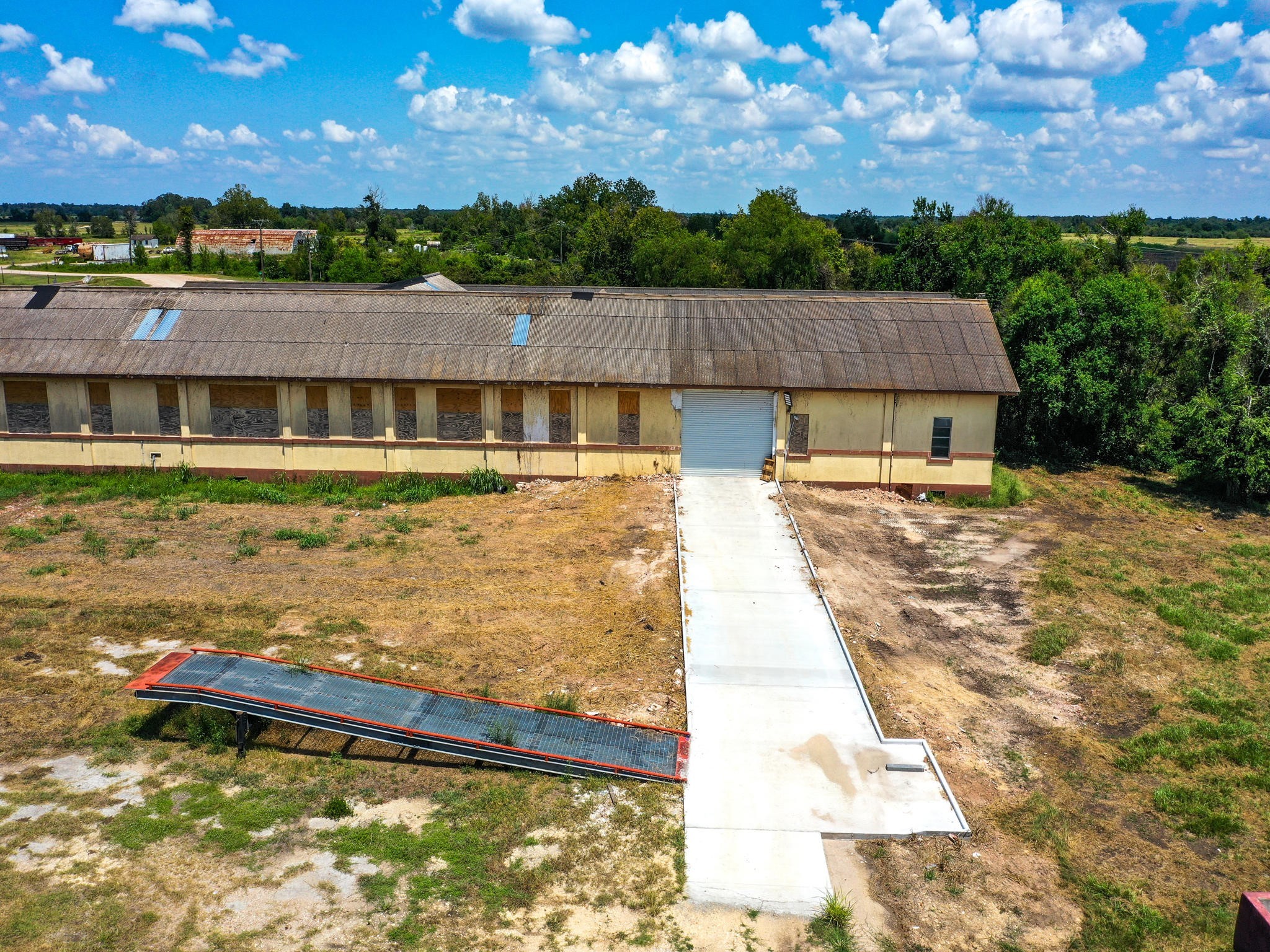 303 Vat Road Boling, TX 77420 - Photo 17 of 31 a front view of a house with a yard