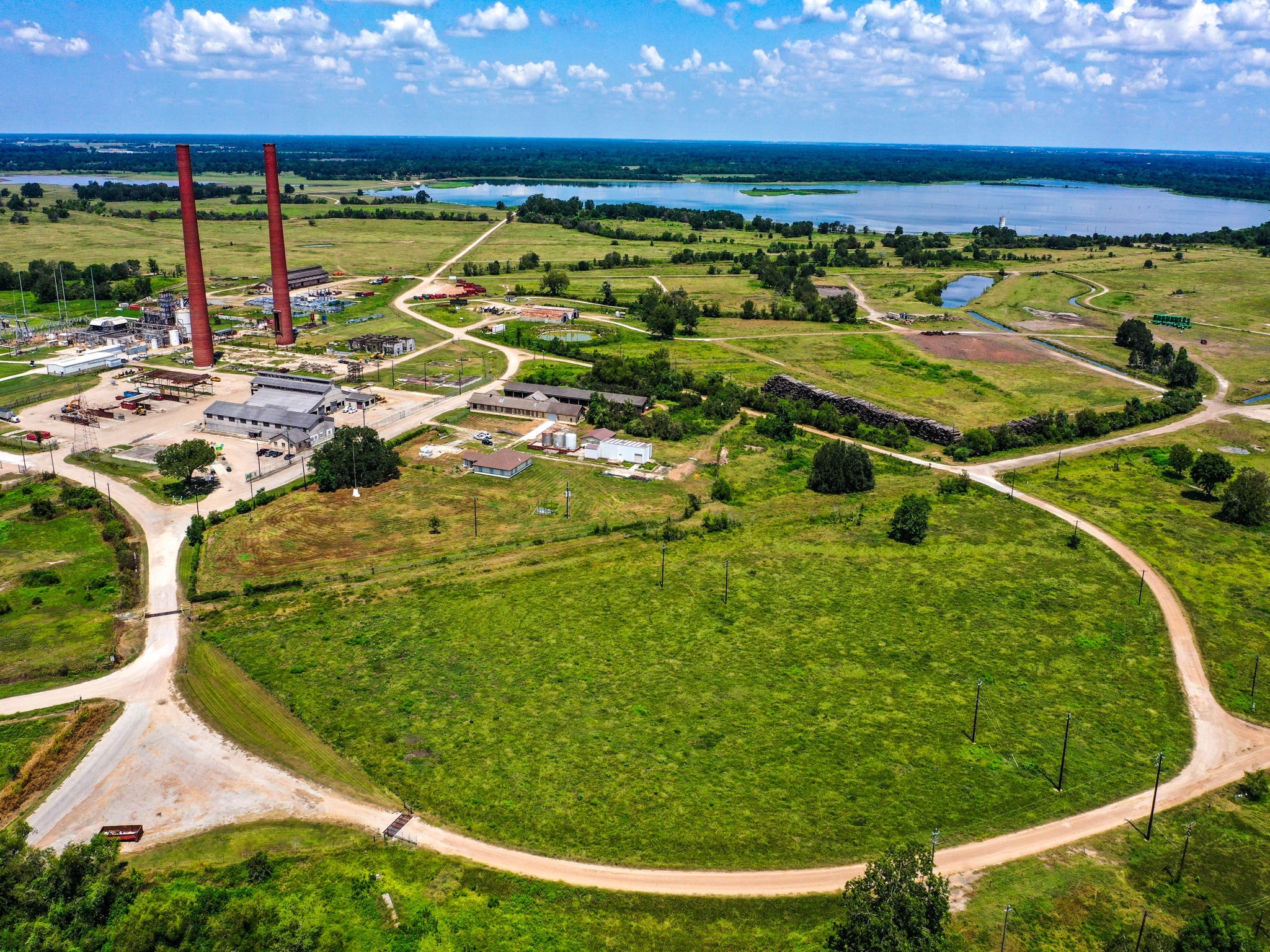 303 Vat Road Boling, TX 77420 - Photo 18 of 31 a view of a swimming pool with a yard