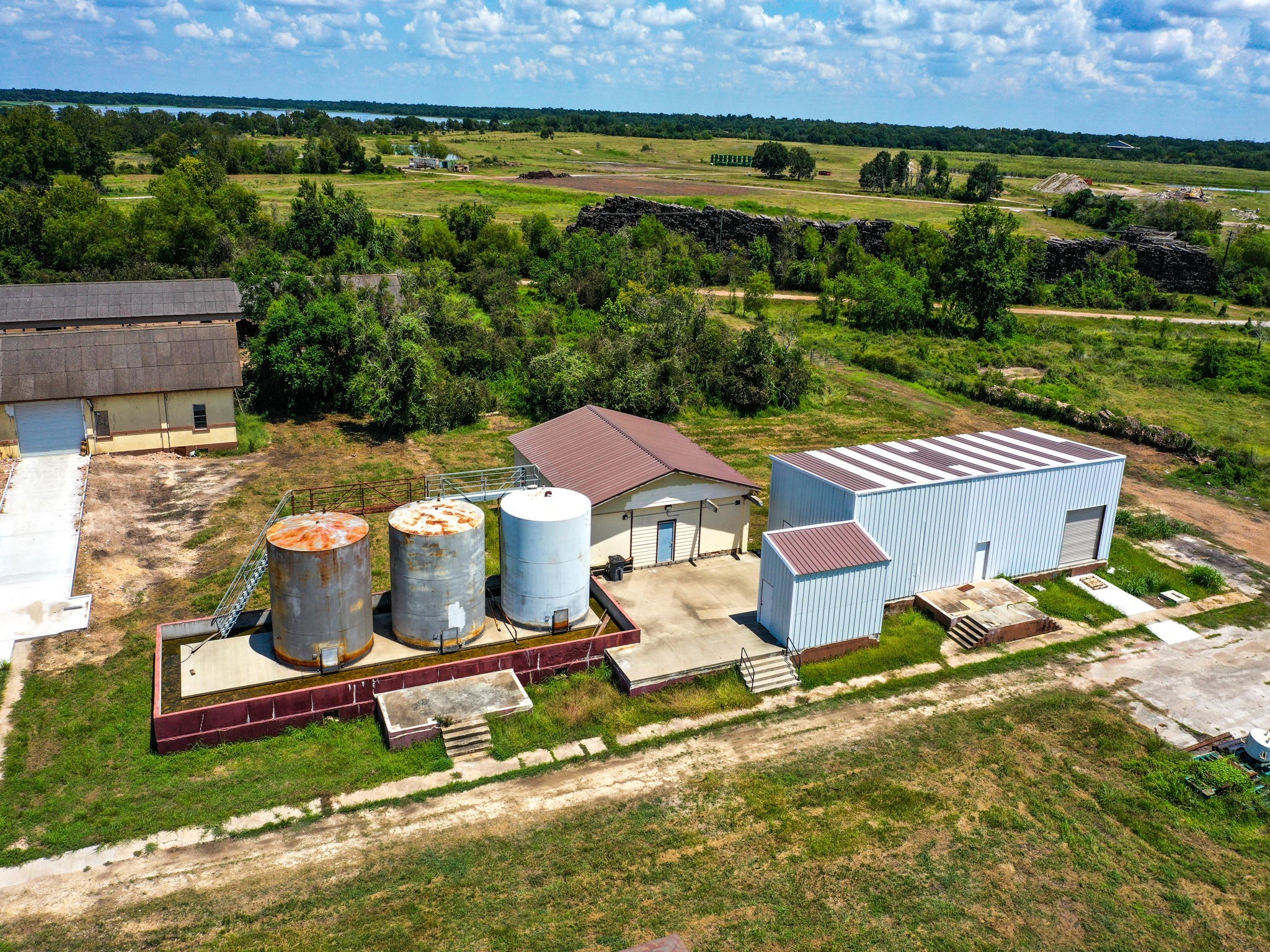 303 Vat Road Boling, TX 77420 - Photo 23 of 31 an aerial view of a house with garden space and street view