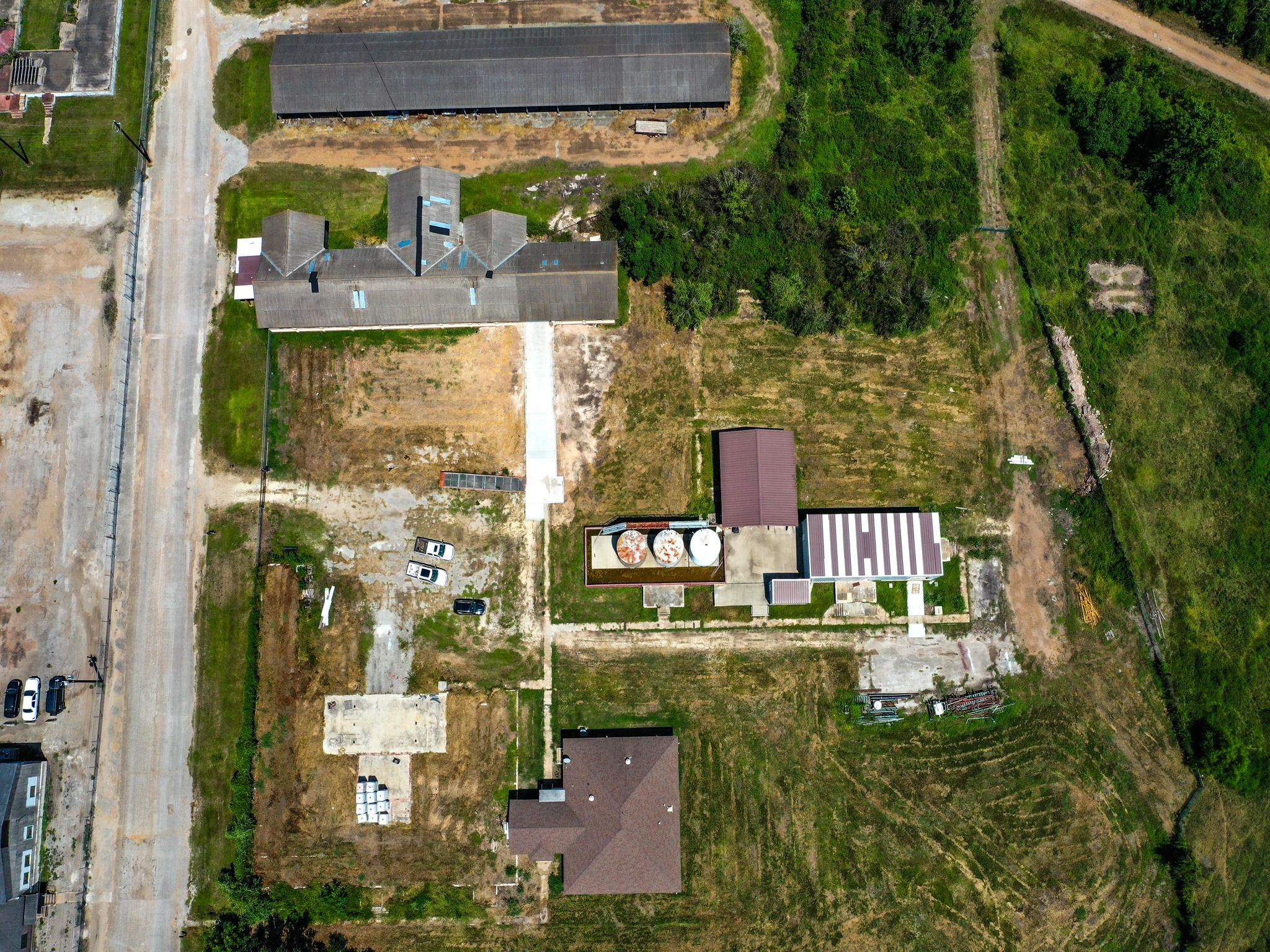 303 Vat Road Boling, TX 77420 - Photo 9 of 31 an aerial view of houses with an outdoor space and seating