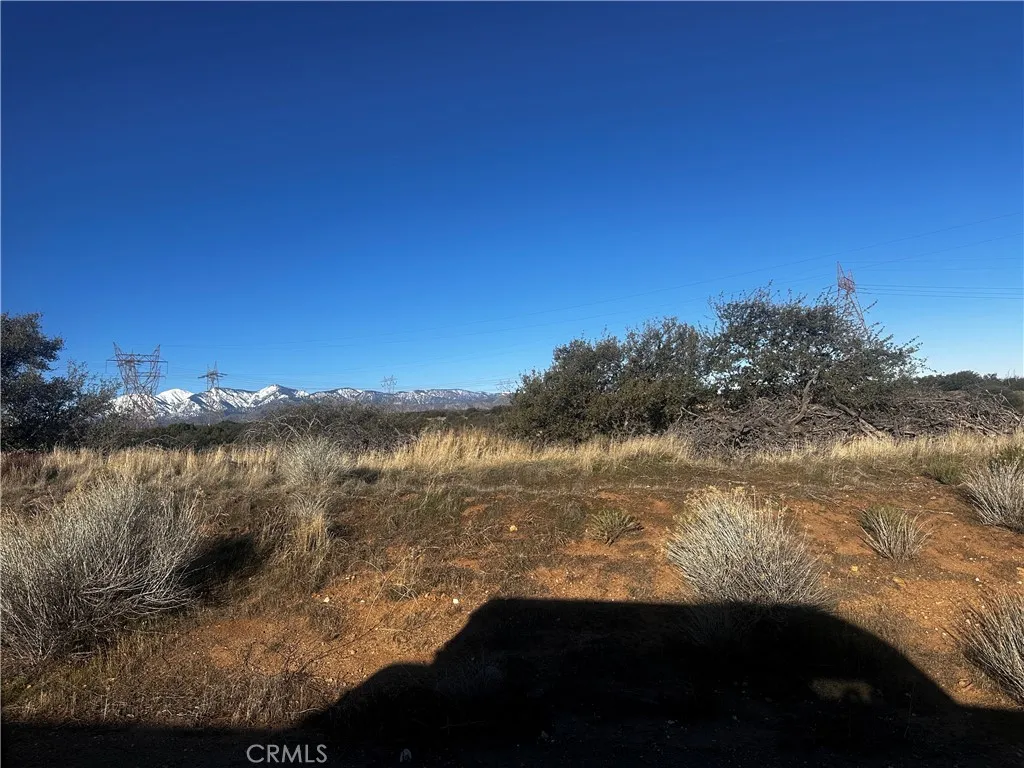 0 Alta Mesa Road Oak Hills, CA 92344 - Photo 6 of 6 a view of a lake from a yard