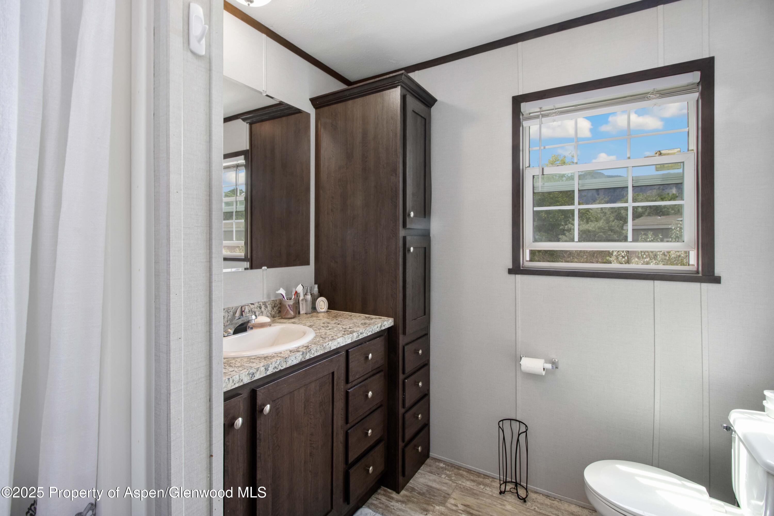 88 West Carson Circle Parachute, CO 81635 - Photo 15 of 18 a bathroom with a sink a toilet and shower