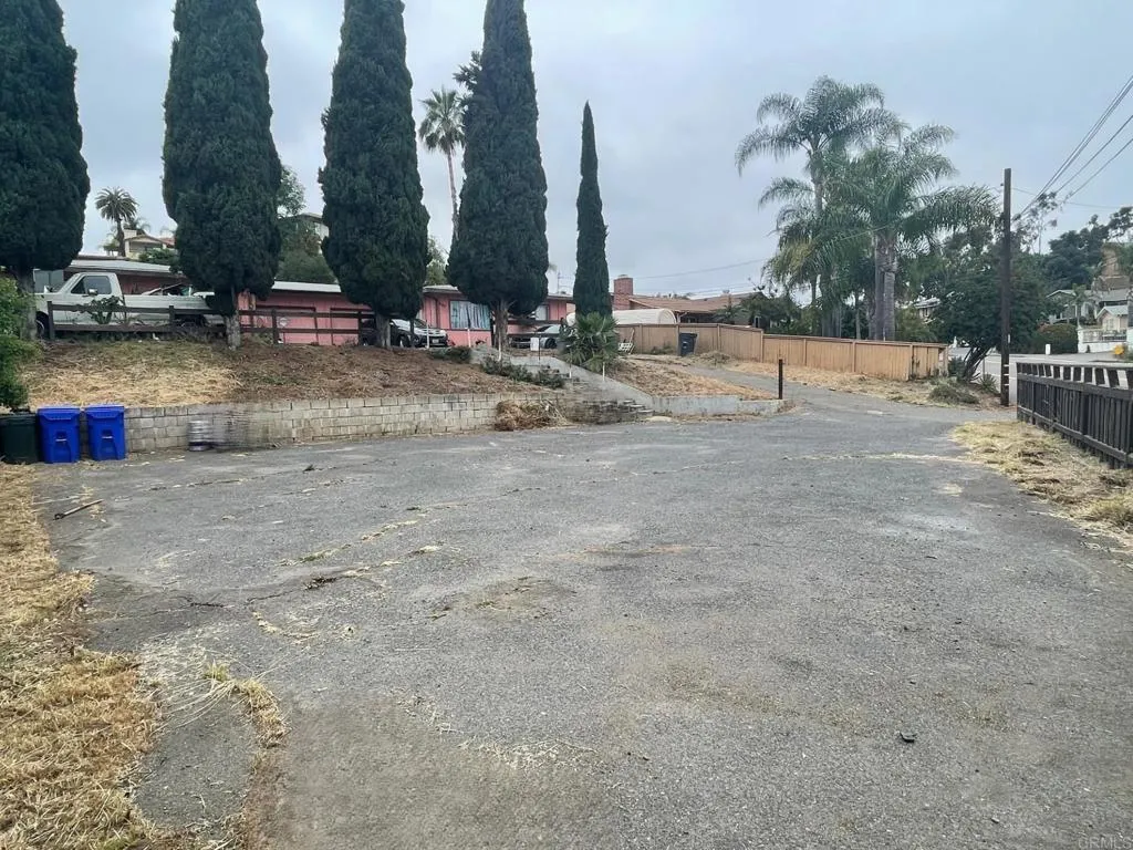 665 Townsite Drive Vista, CA 92084 - Photo 8 of 8 a view of a park with swings and slides