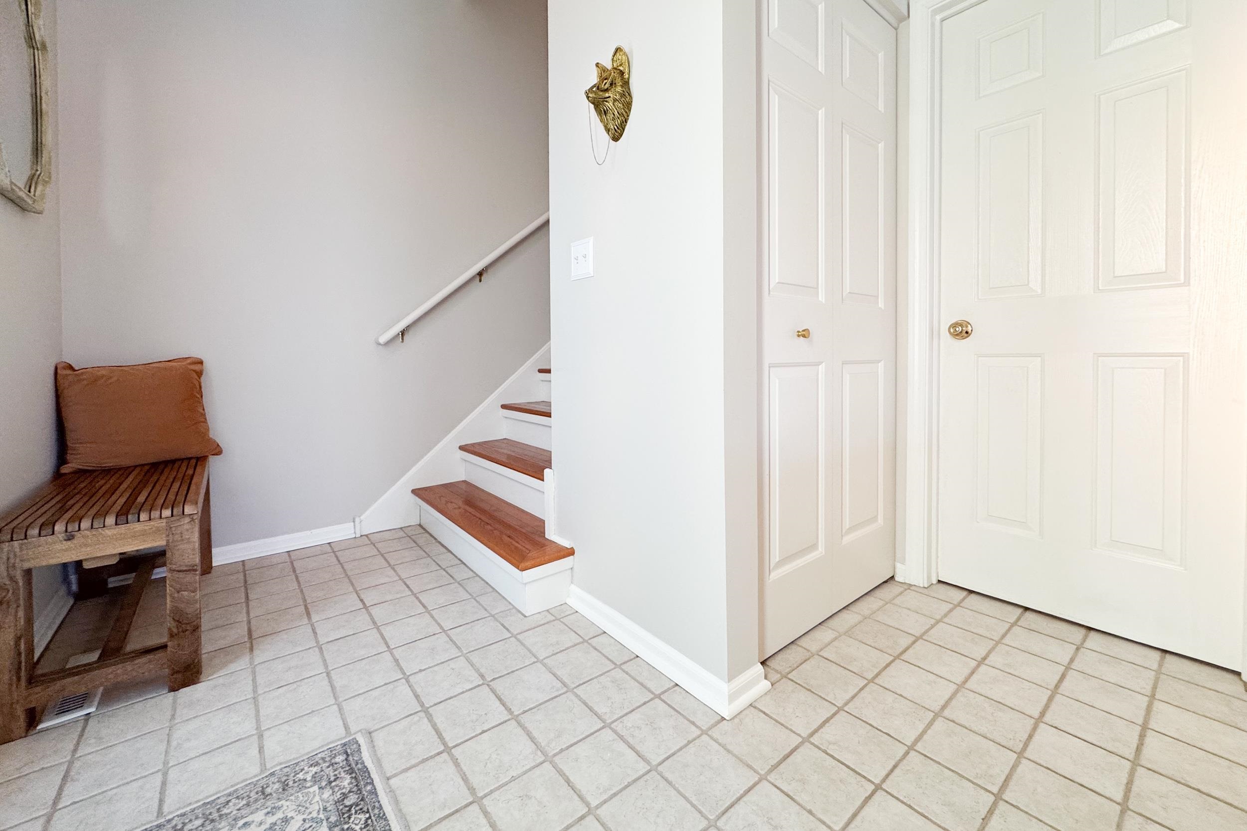 7253 Chucks Way Loves Park, IL 61111 - Photo 14 of 26 a view of an entryway with staircase