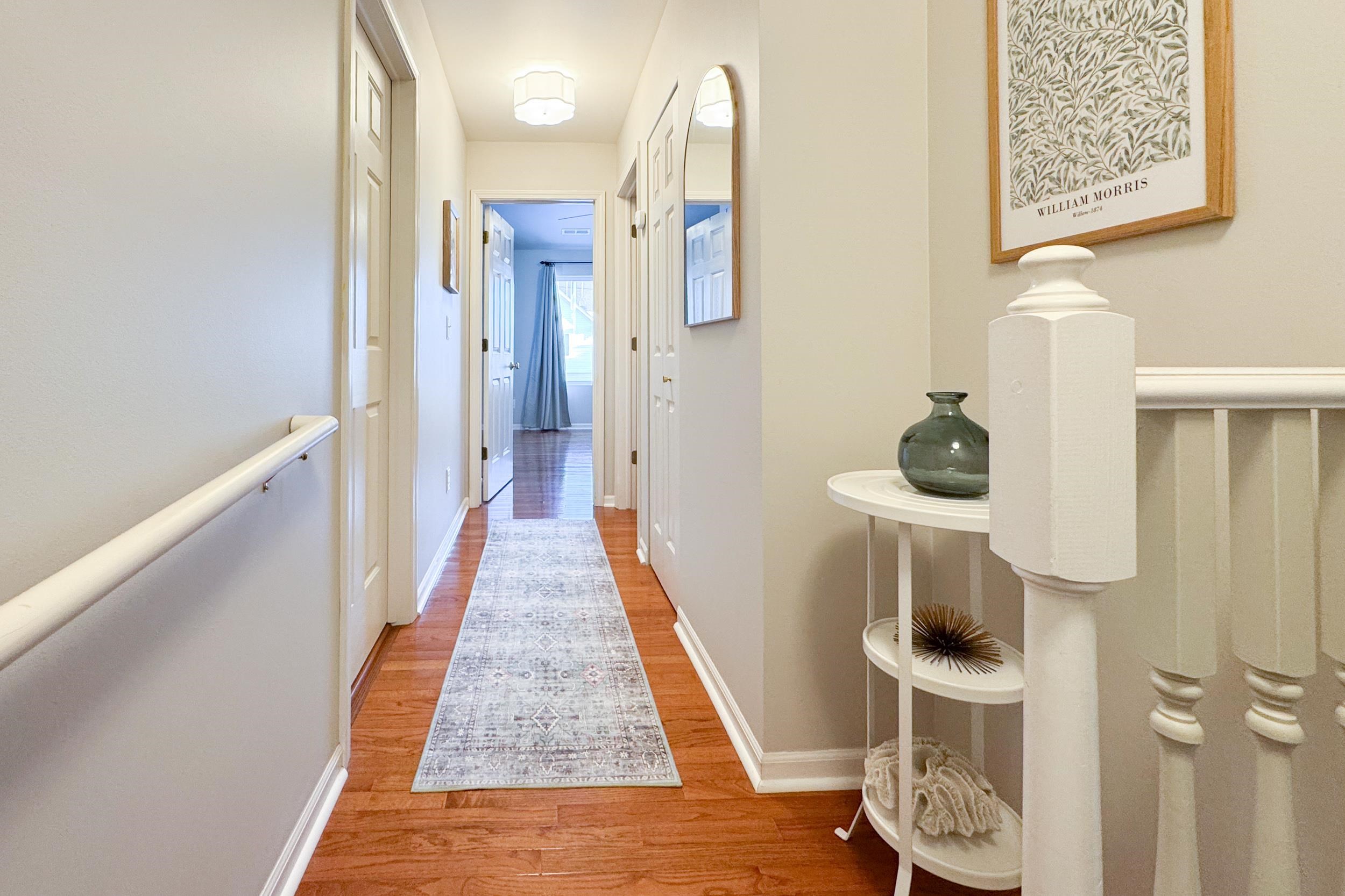 7253 Chucks Way Loves Park, IL 61111 - Photo 17 of 26 a view of hallway with wooden floor