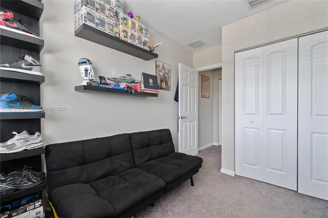 a living room with furniture and a couch