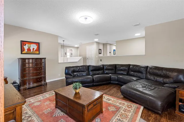 a bedroom with a bed and dresser