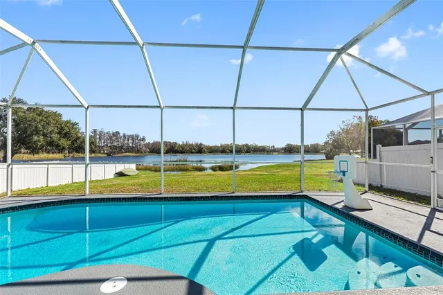 a view of a lake with a city