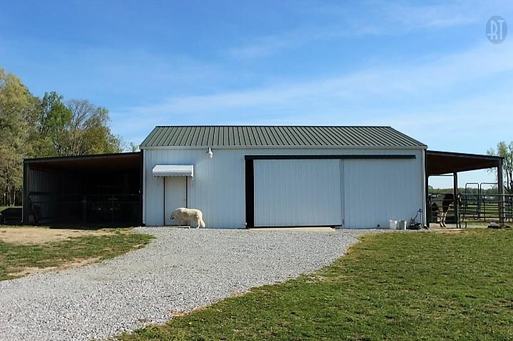 1137 Robinson Road Manchester, TN 37355 - Photo 4 of 30 30X40 BARN W/5 STALLS, TACK ROOM, 3 LEAN SHEDS, 200 AMP SERVICE, & WATER.