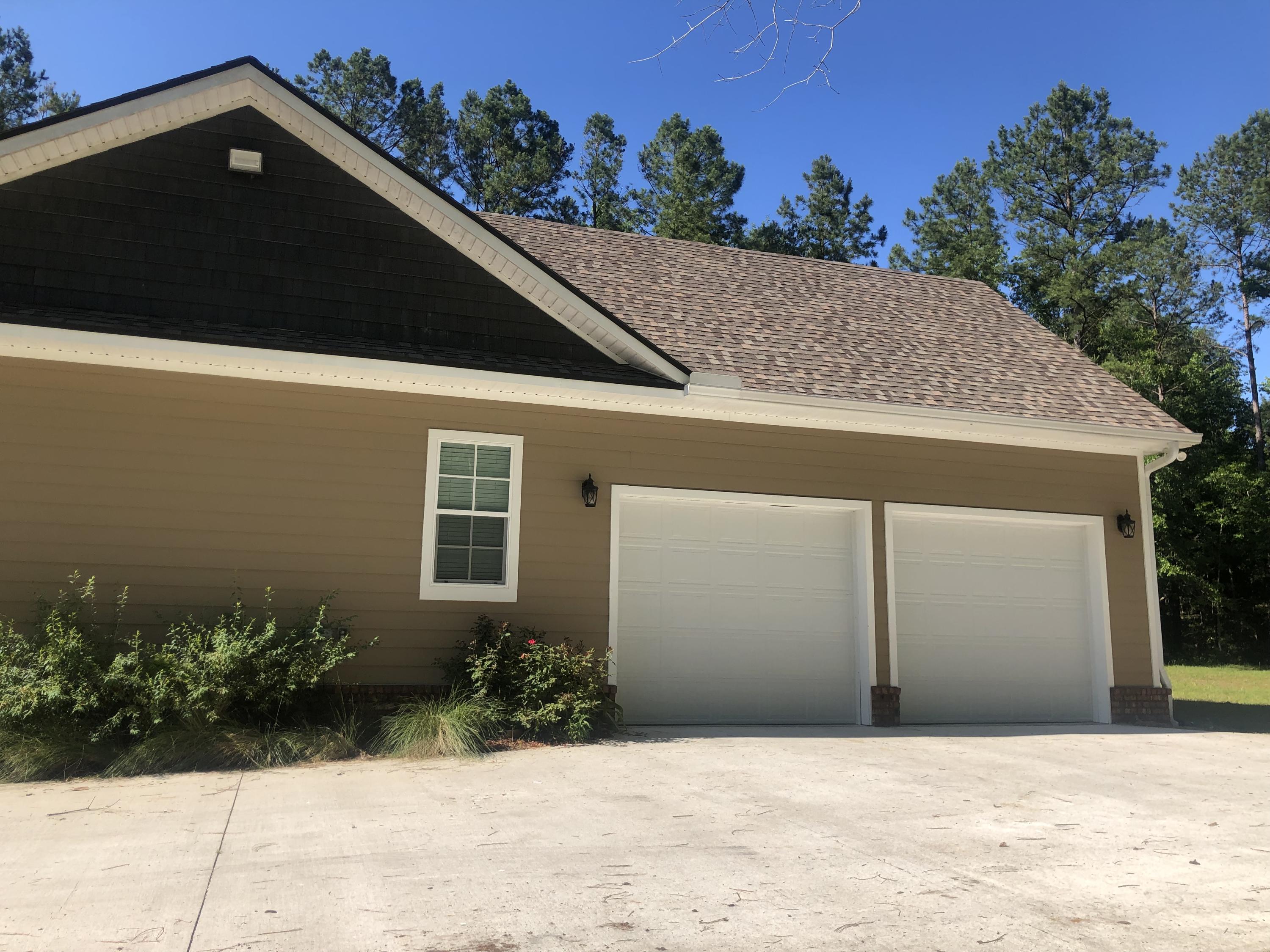 2577 Boy Scout Road DeFuniak Springs, FL 32435 - Photo 4 of 4 a front view of a house with a yard