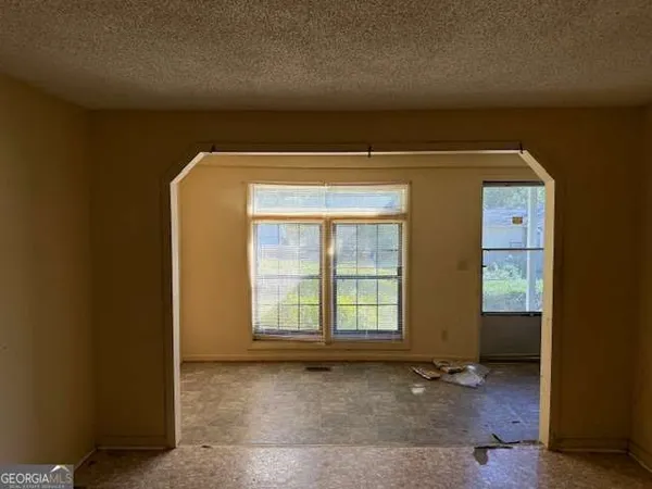 an empty room with windows