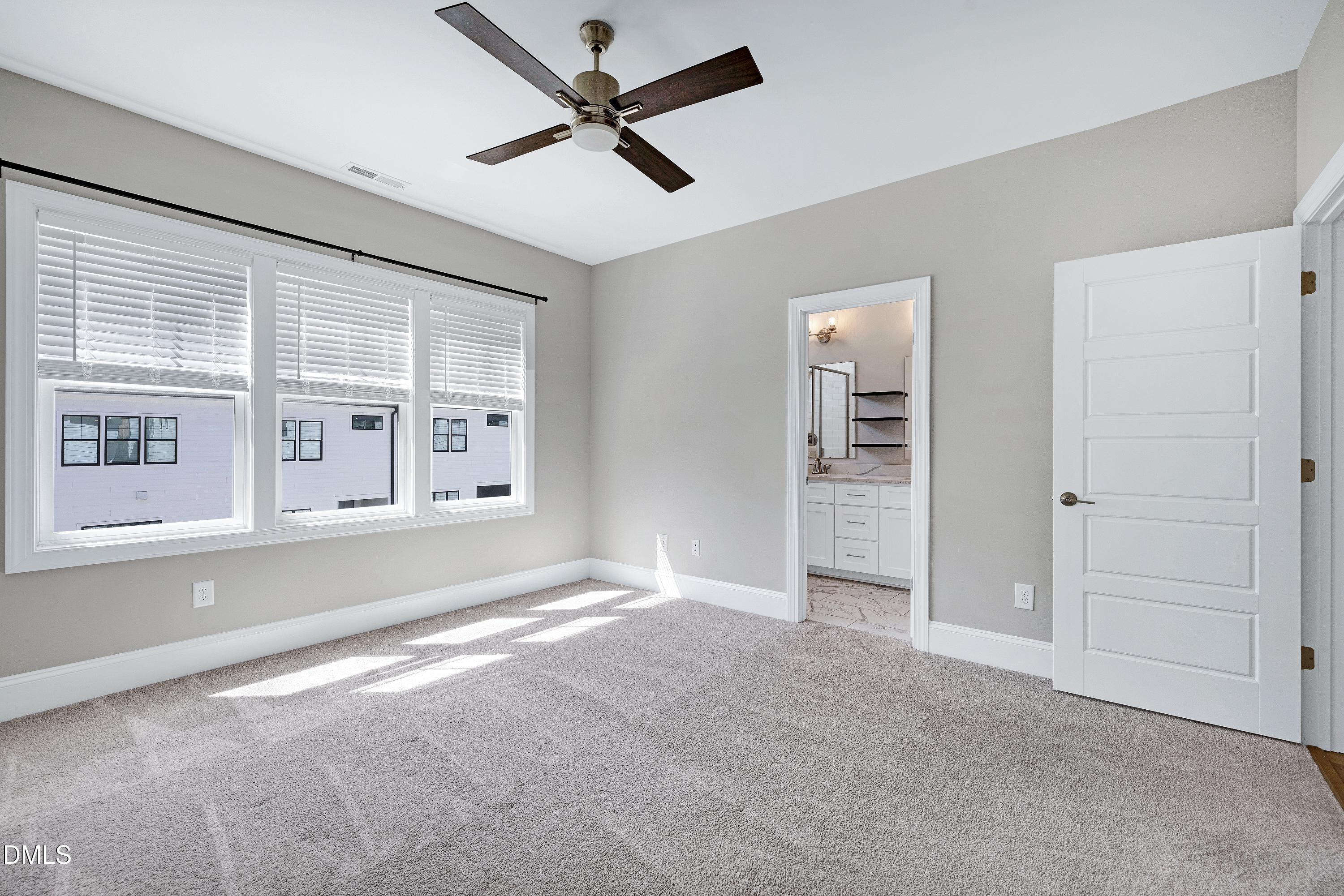 4909 Madone Drive Raleigh, NC 27606 - Photo 21 of 48 a view of an empty room with a window