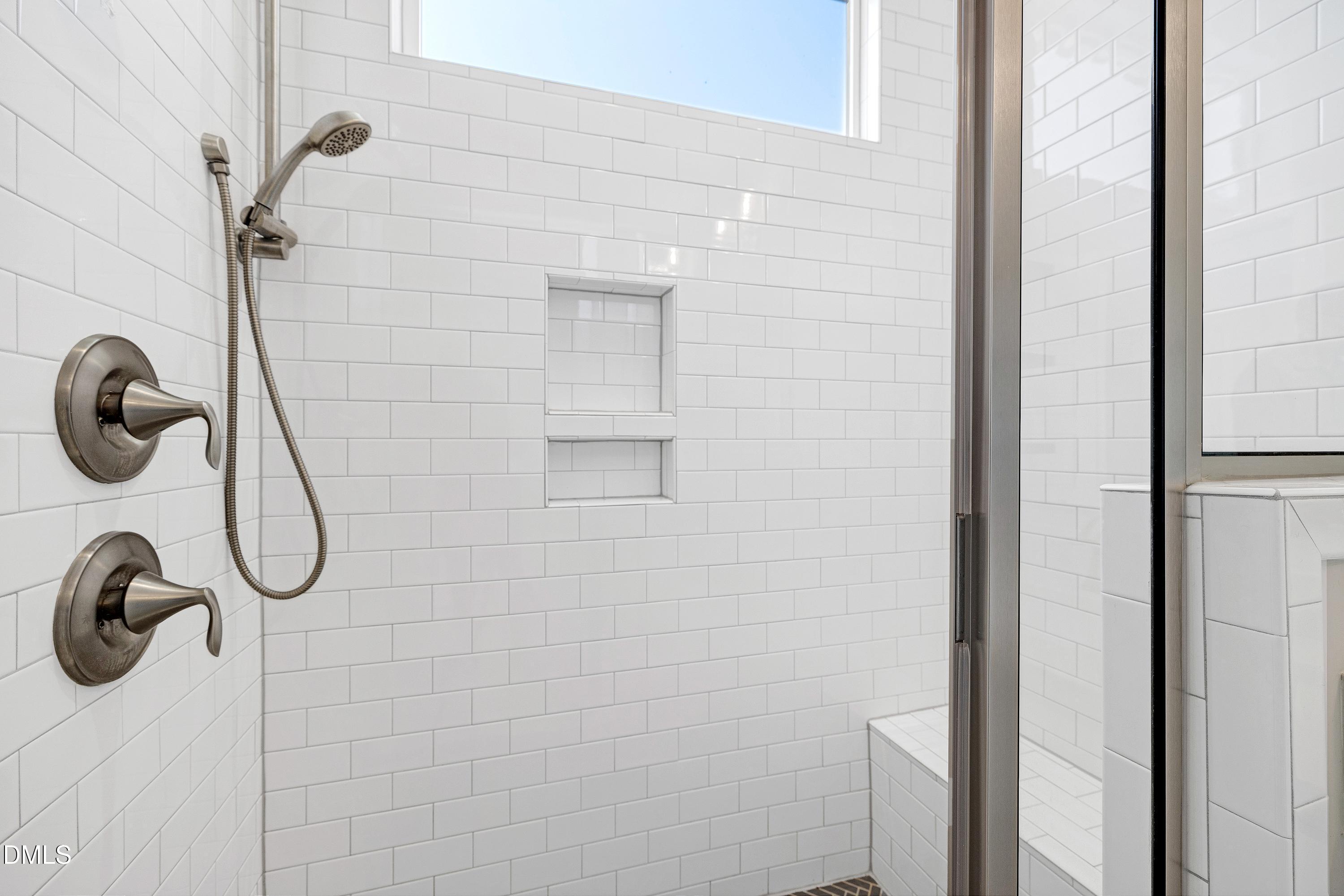 4909 Madone Drive Raleigh, NC 27606 - Photo 25 of 48 a bathroom with a shower