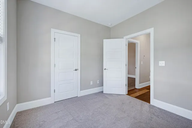 an empty room with closet