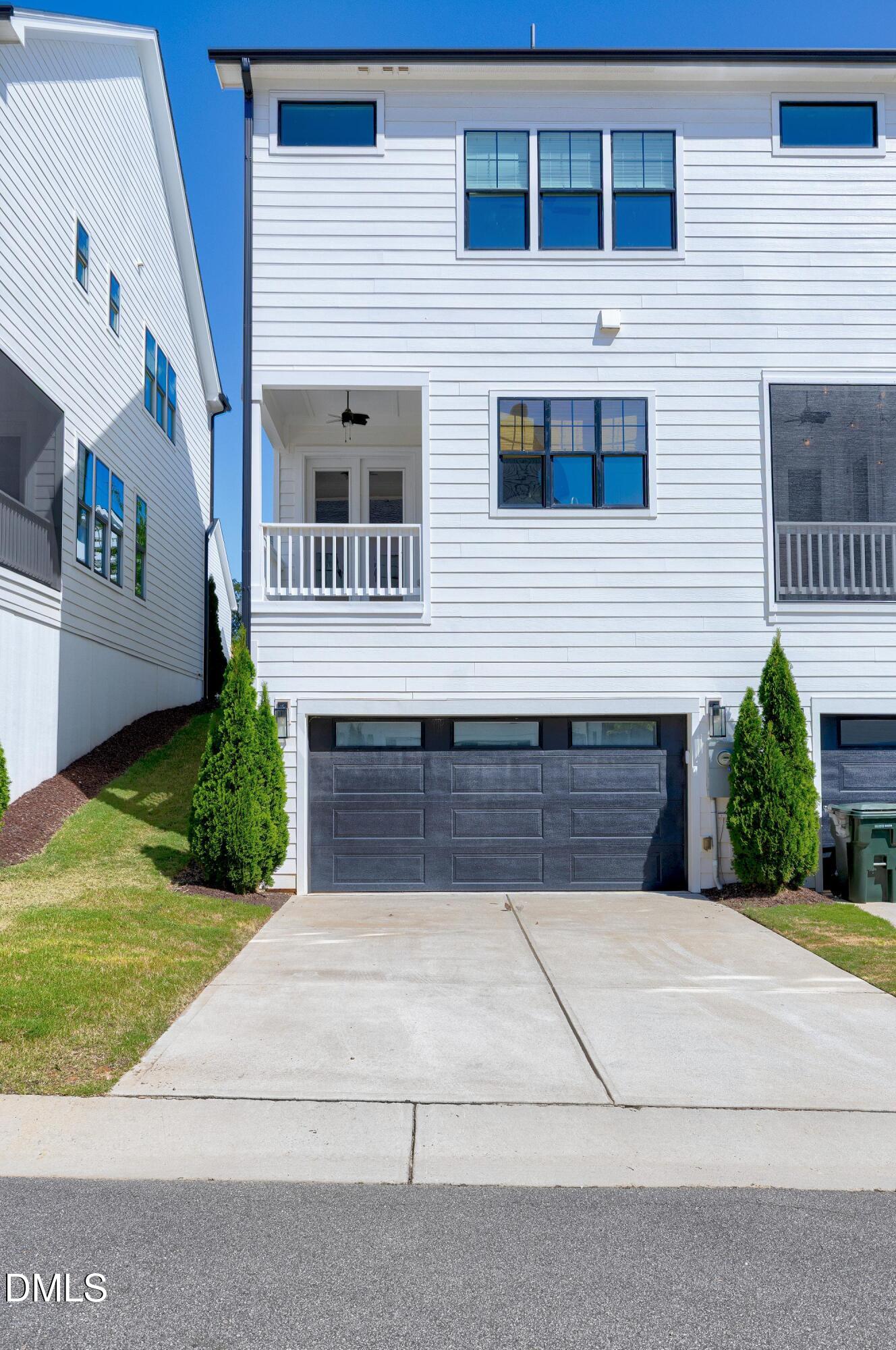 4909 Madone Drive Raleigh, NC 27606 - Photo 48 of 48 a view of front of house with a yard