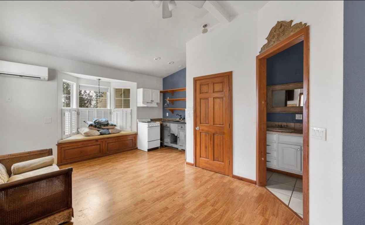 251 Circle Drive Wimberley, TX 78676 - Photo 22 of 32 a room with furniture and storage