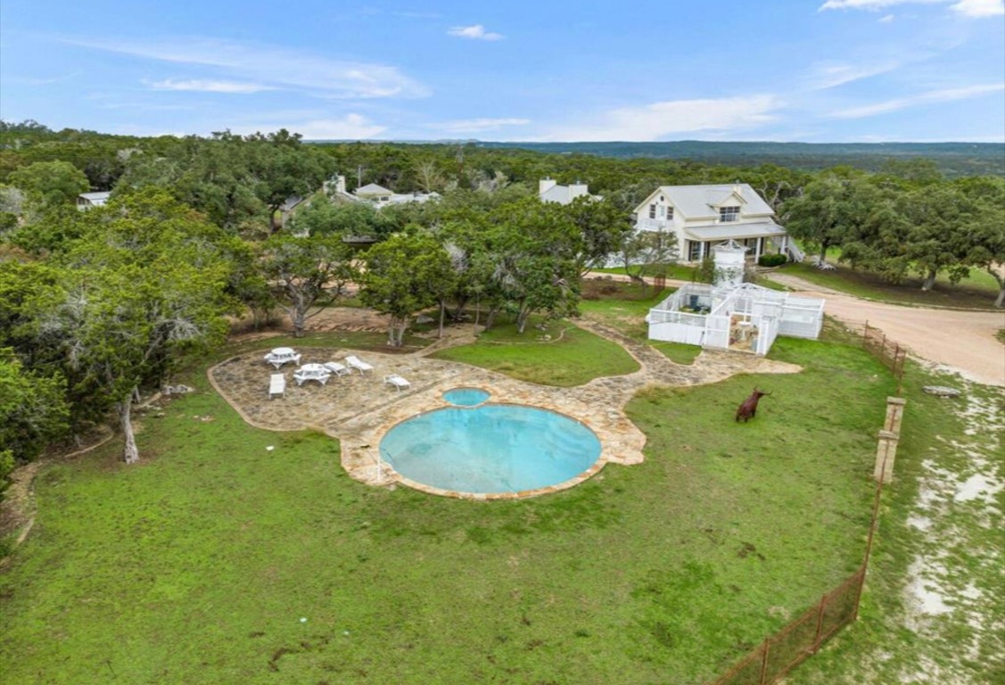 251 Circle Drive Wimberley, TX 78676 - Photo 31 of 32 a view of a swimming pool with a yard