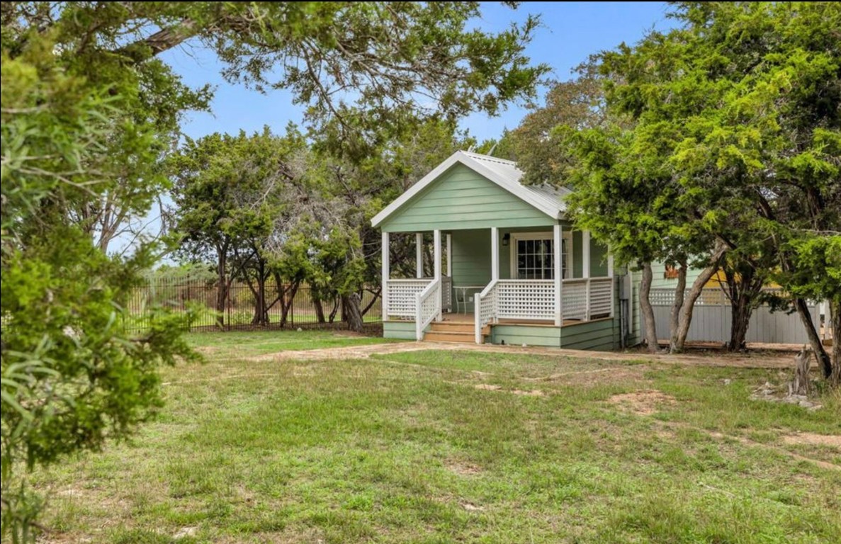 251 Circle Drive Wimberley, TX 78676 - Photo 9 of 32 a view of a house with a yard
