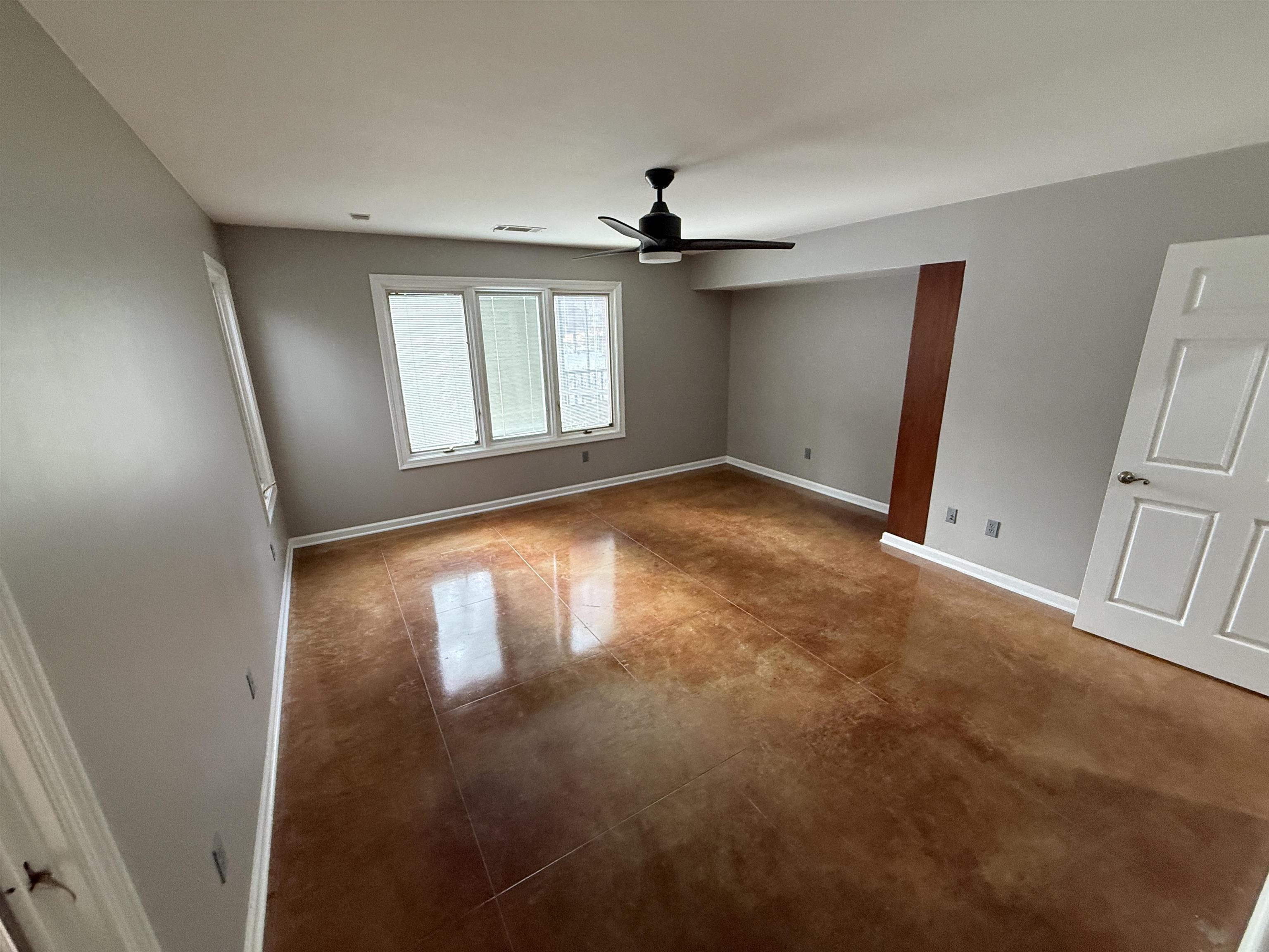 765 Sweetbrier Road Memphis, TN 38120 - Photo 24 of 33 Spare room with a ceiling fan and baseboards
