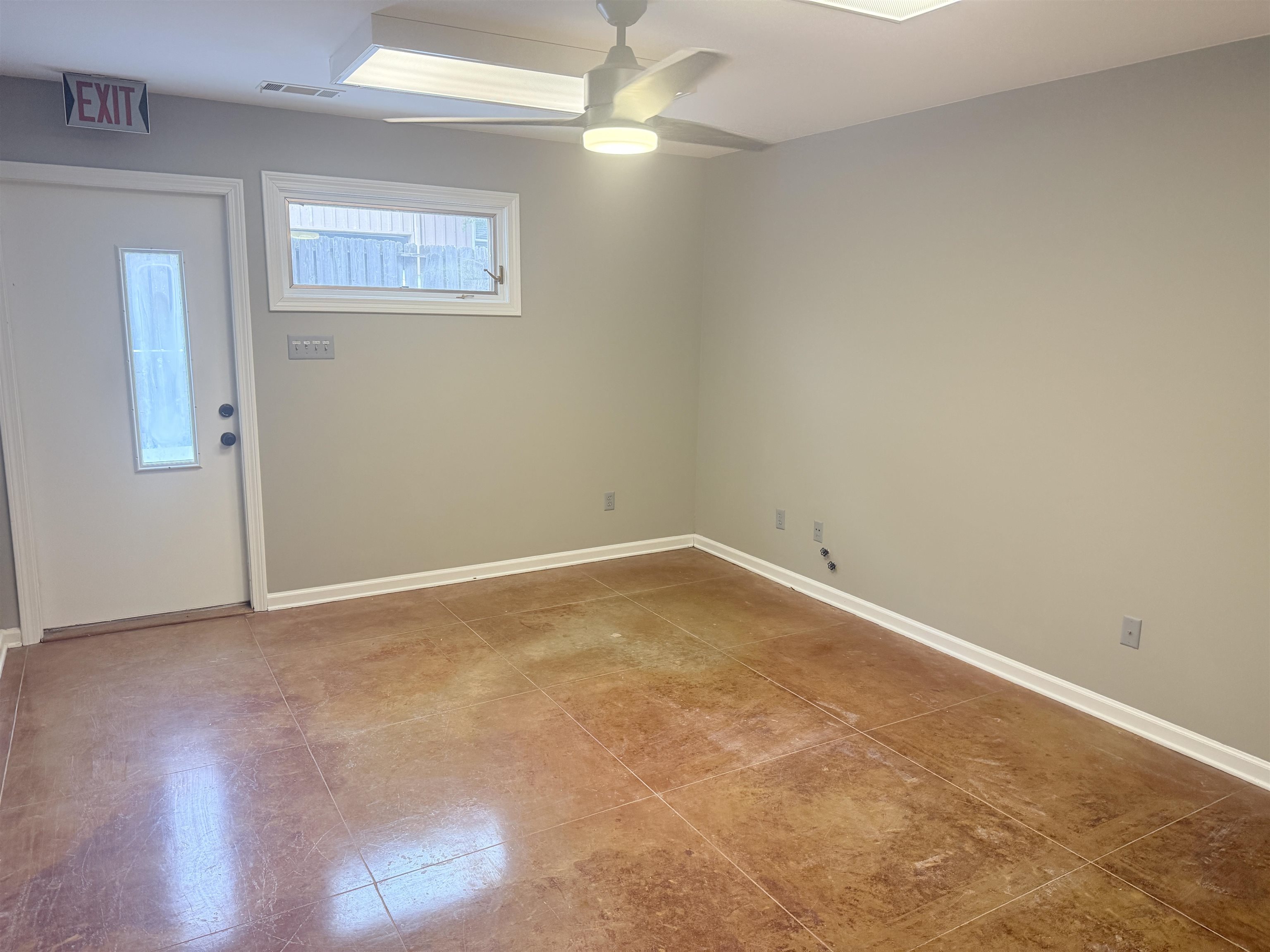 765 Sweetbrier Road Memphis, TN 38120 - Photo 33 of 33 Unfurnished room featuring ceiling fan and baseboards