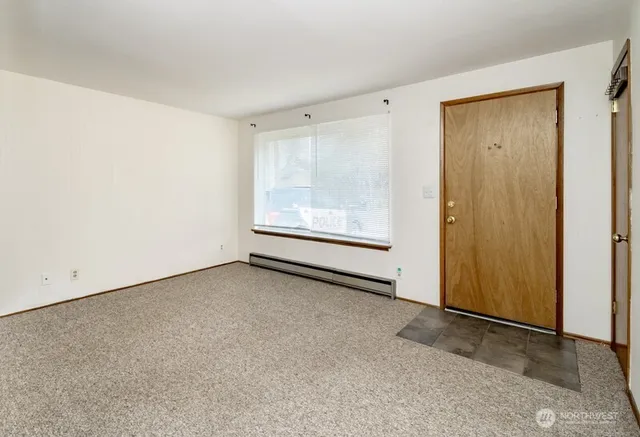 an empty room with a door