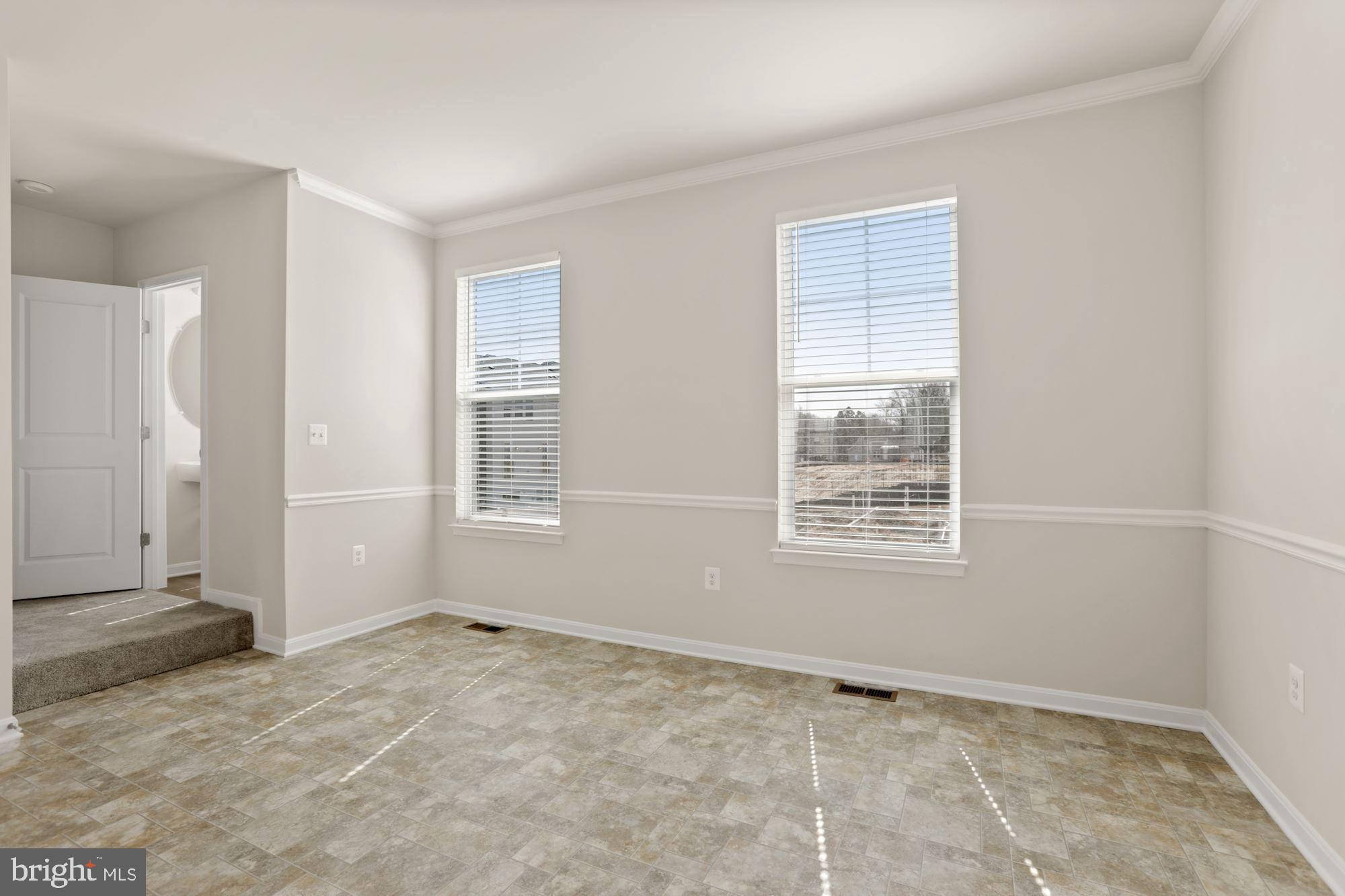 3970 Shire Meadow Lane Triangle, VA 22172 - Photo 23 of 52 a view of an empty room with a window