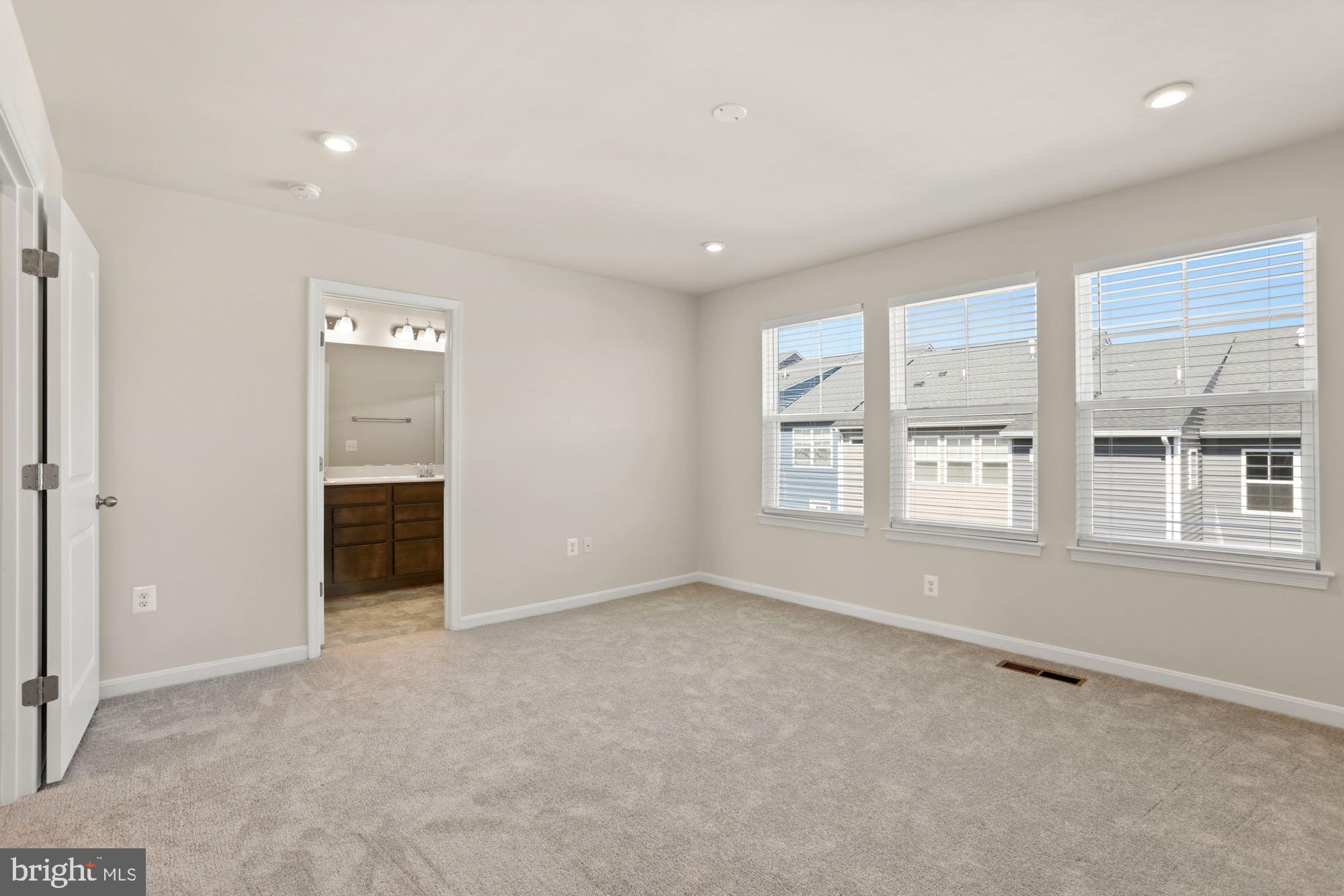 3970 Shire Meadow Lane Triangle, VA 22172 - Photo 28 of 52 an empty room with windows