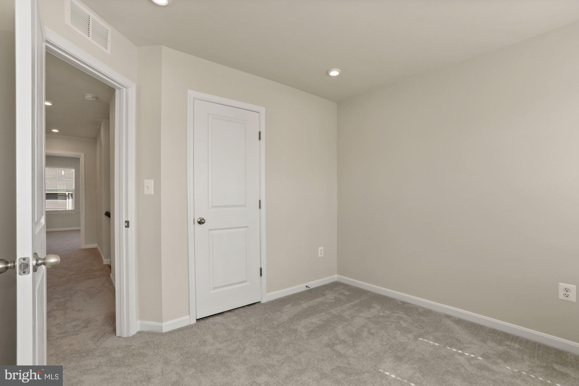 3970 Shire Meadow Lane Triangle, VA 22172 - Photo 33 of 52 an empty room with closet area