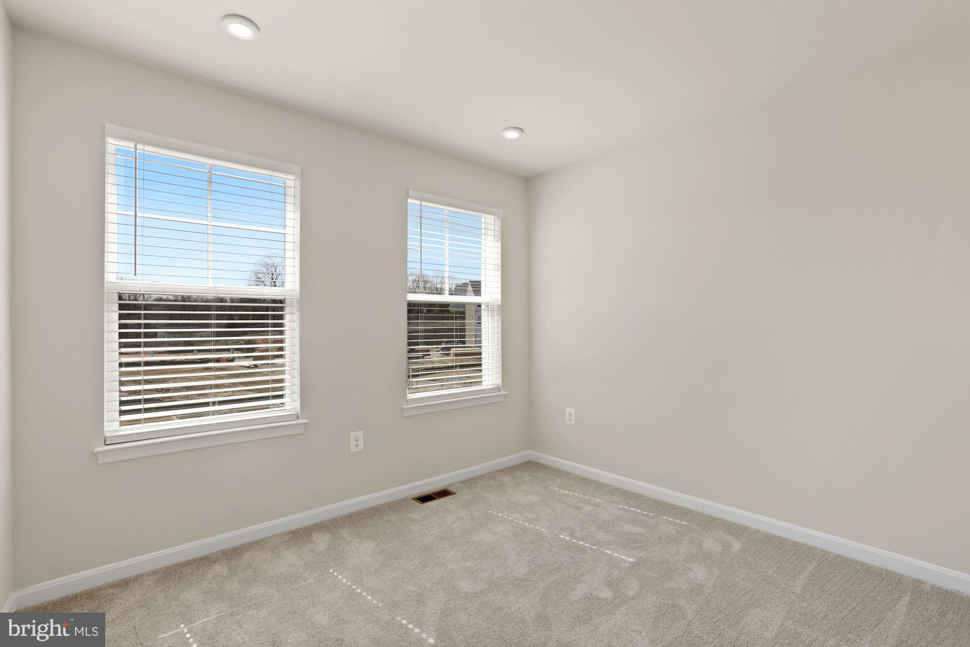 3970 Shire Meadow Lane Triangle, VA 22172 - Photo 35 of 52 a view of an empty room with a window