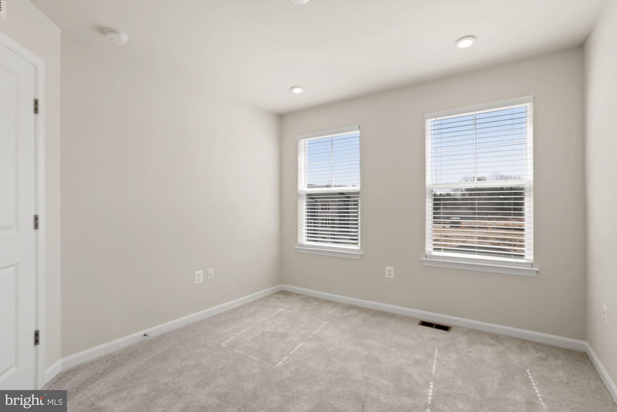 3970 Shire Meadow Lane Triangle, VA 22172 - Photo 38 of 52 a view of an empty room with a window