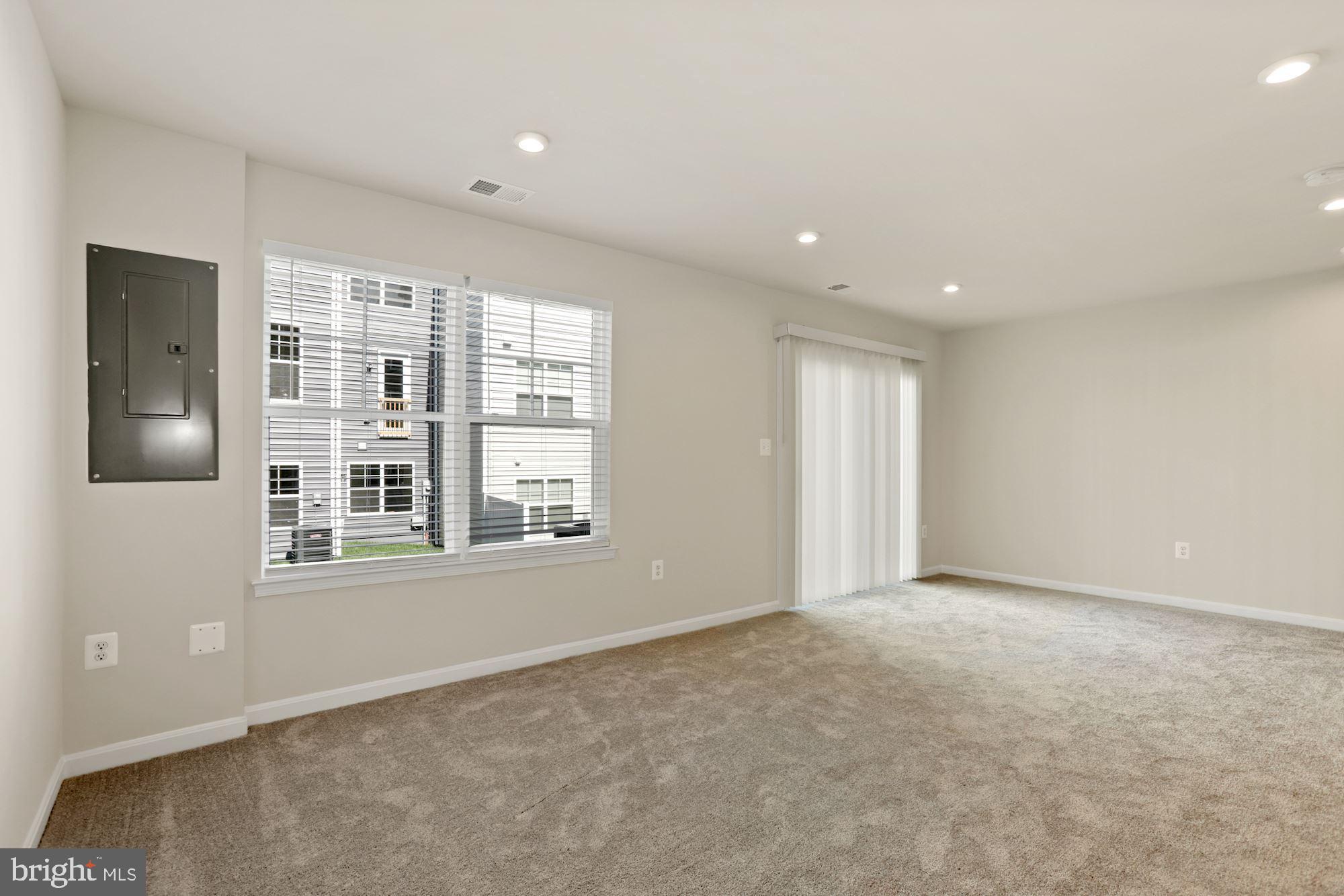 3970 Shire Meadow Lane Triangle, VA 22172 - Photo 47 of 52 an empty room with a window