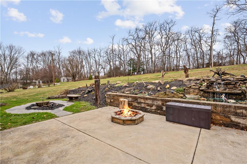 355 Middletown Road New Stanton, PA 15672 - Photo 17 of 21 a view of a backyard with sitting area