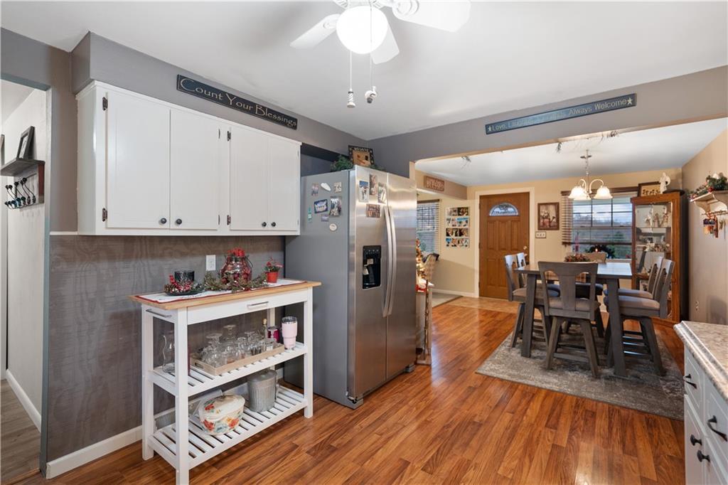 355 Middletown Road New Stanton, PA 15672 - Photo 6 of 21 a kitchen with stainless steel appliances wooden floor and refrigerator