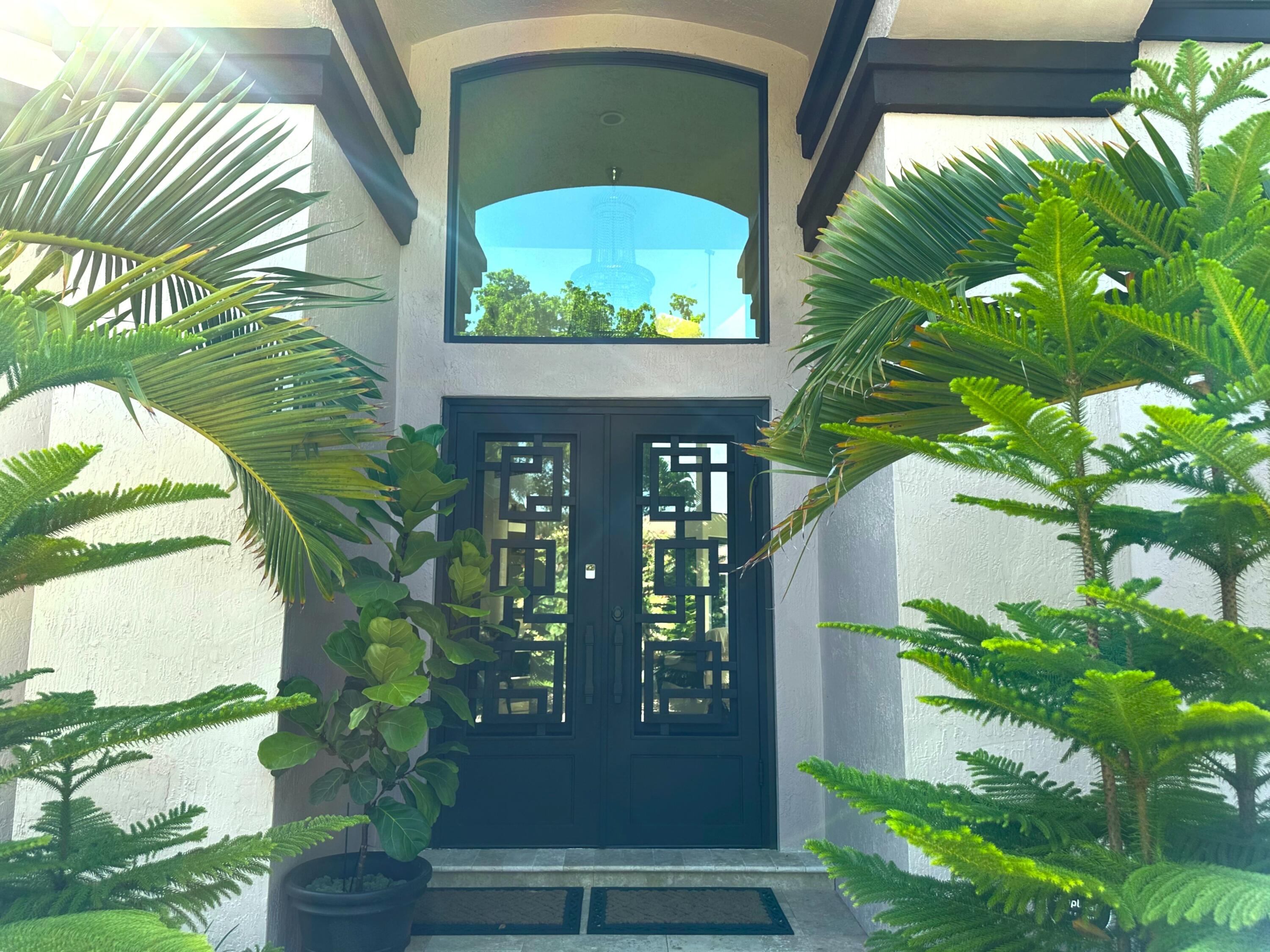 4880 Northwest 28th Way Boca Raton, FL 33434 - Photo 8 of 54 Bo_FrontDoor1