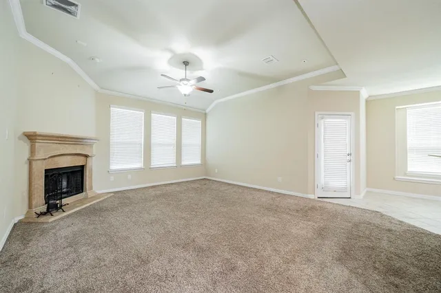 a view of a kitchen with a sink and a fireplace