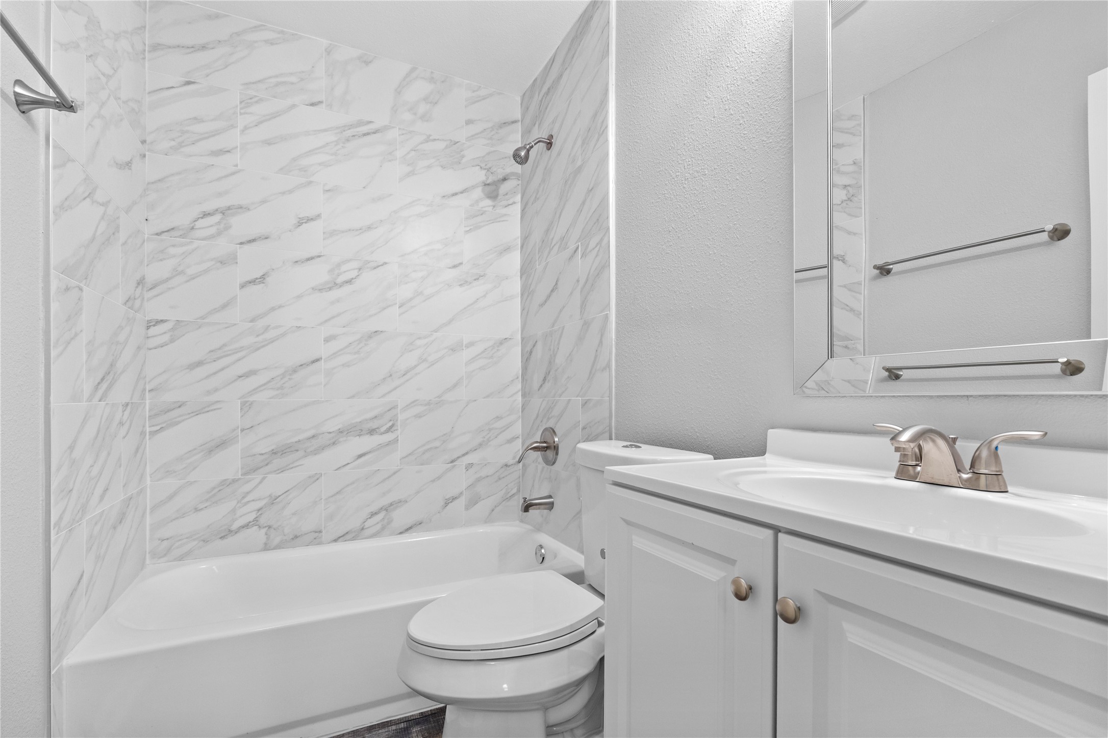 4838 Van Fleet Street Houston, TX 77033 - Photo 9 of 19 Fully updated bathroom includes a stand up shower/tub combo.