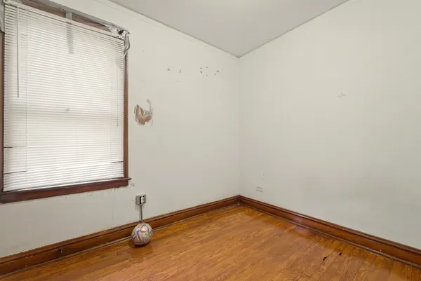 a bathroom with a sink and mirror with toilet