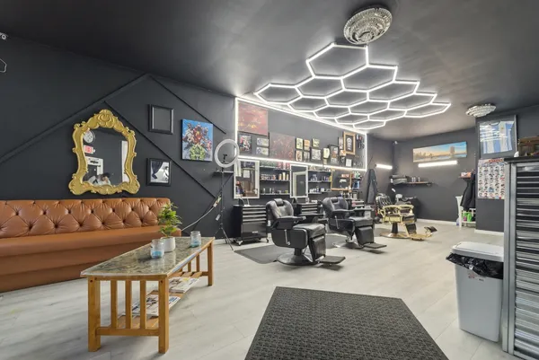 a living room with furniture and a rug
