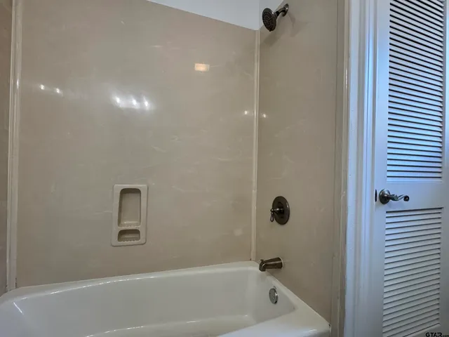 a view of a hallway with entryway