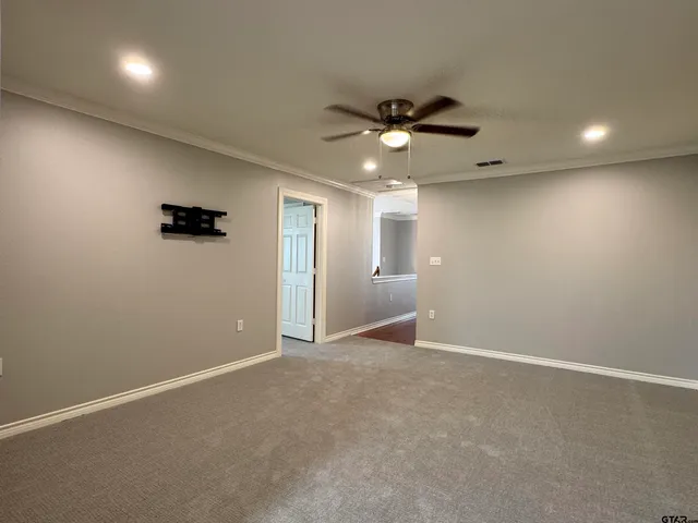 a bathroom with a toilet a sink and bathtub