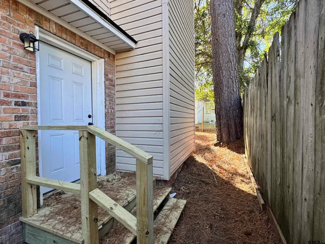 a view of a house with white door
