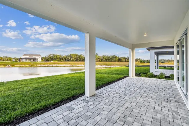 a view of a garden and an ocean