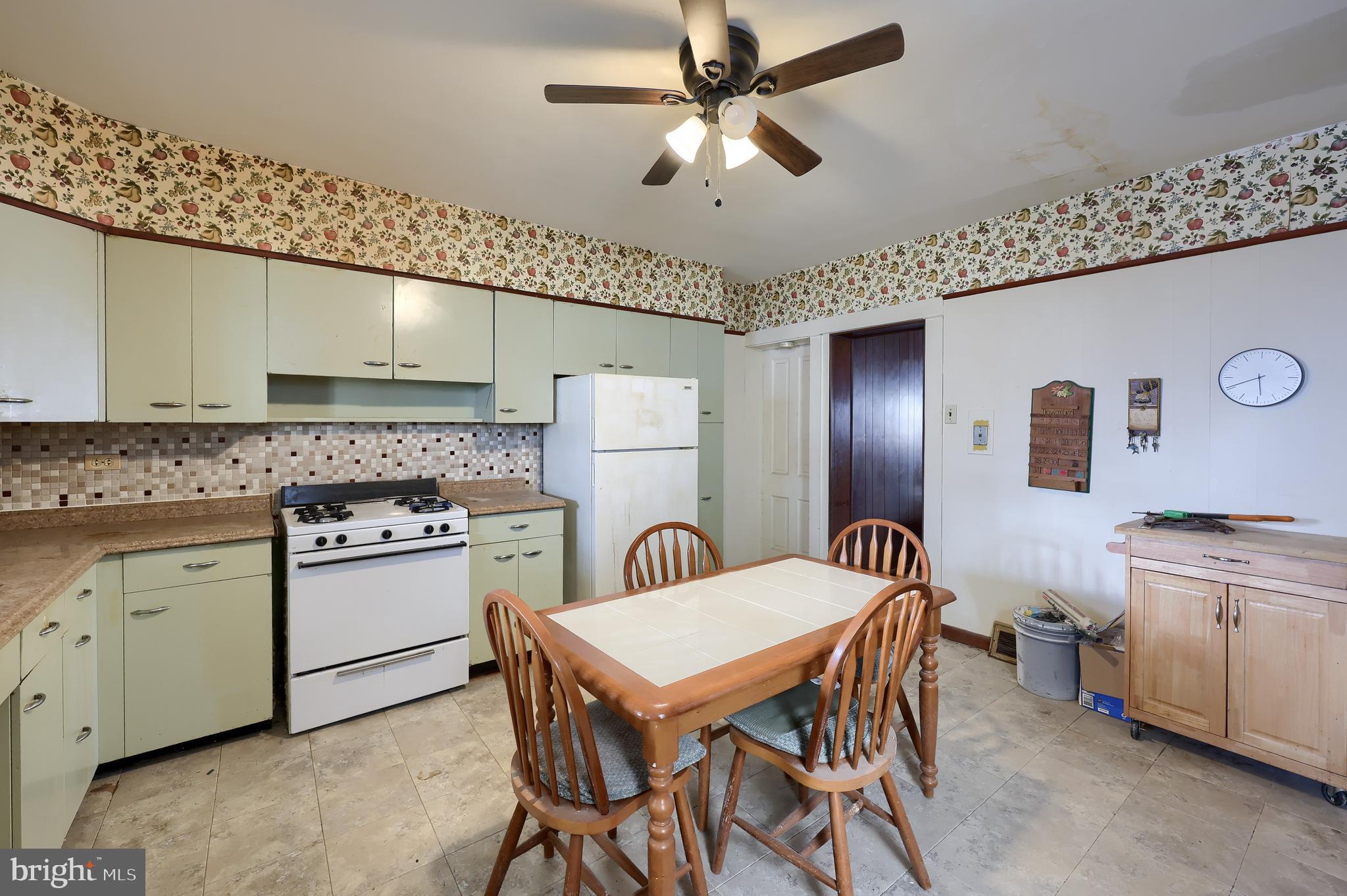 14 West New Street Lancaster, PA 17603 - Photo 9 of 21 a kitchen that has a cabinets counter space and stainless steel appliances