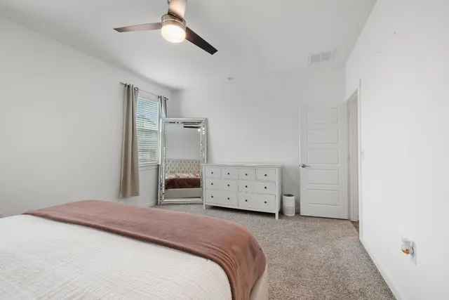 a bathroom with a sink vanity and a mirror