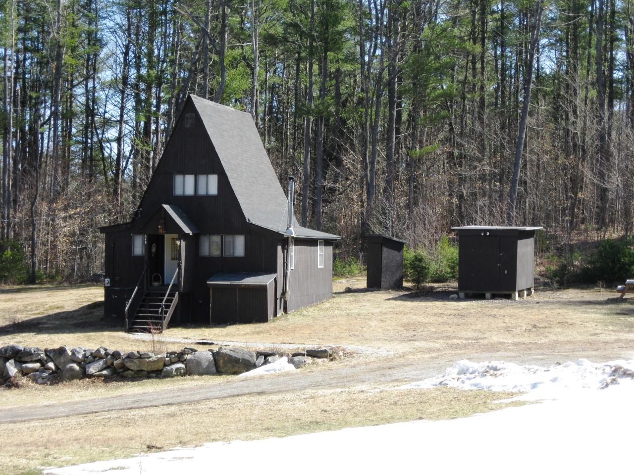 648 East Otis Road Otis, MA 01253 - Photo 13 of 15 a front view of a house with a yard