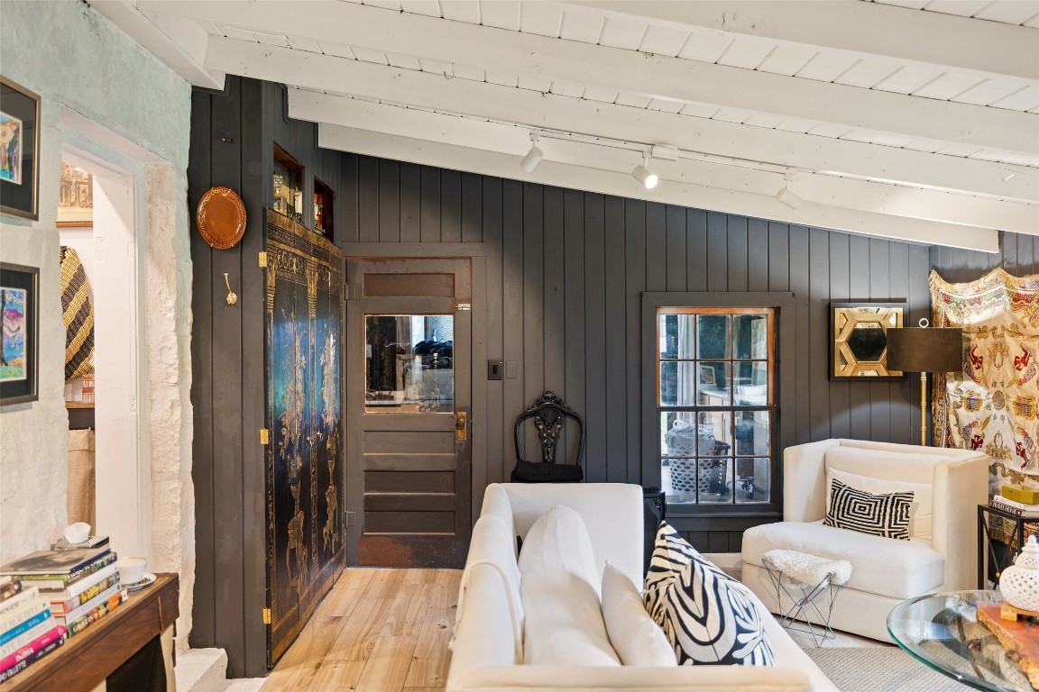 400 Lange Road Wimberley, TX 78676 - Photo 12 of 25 a living room with furniture and a flat screen tv