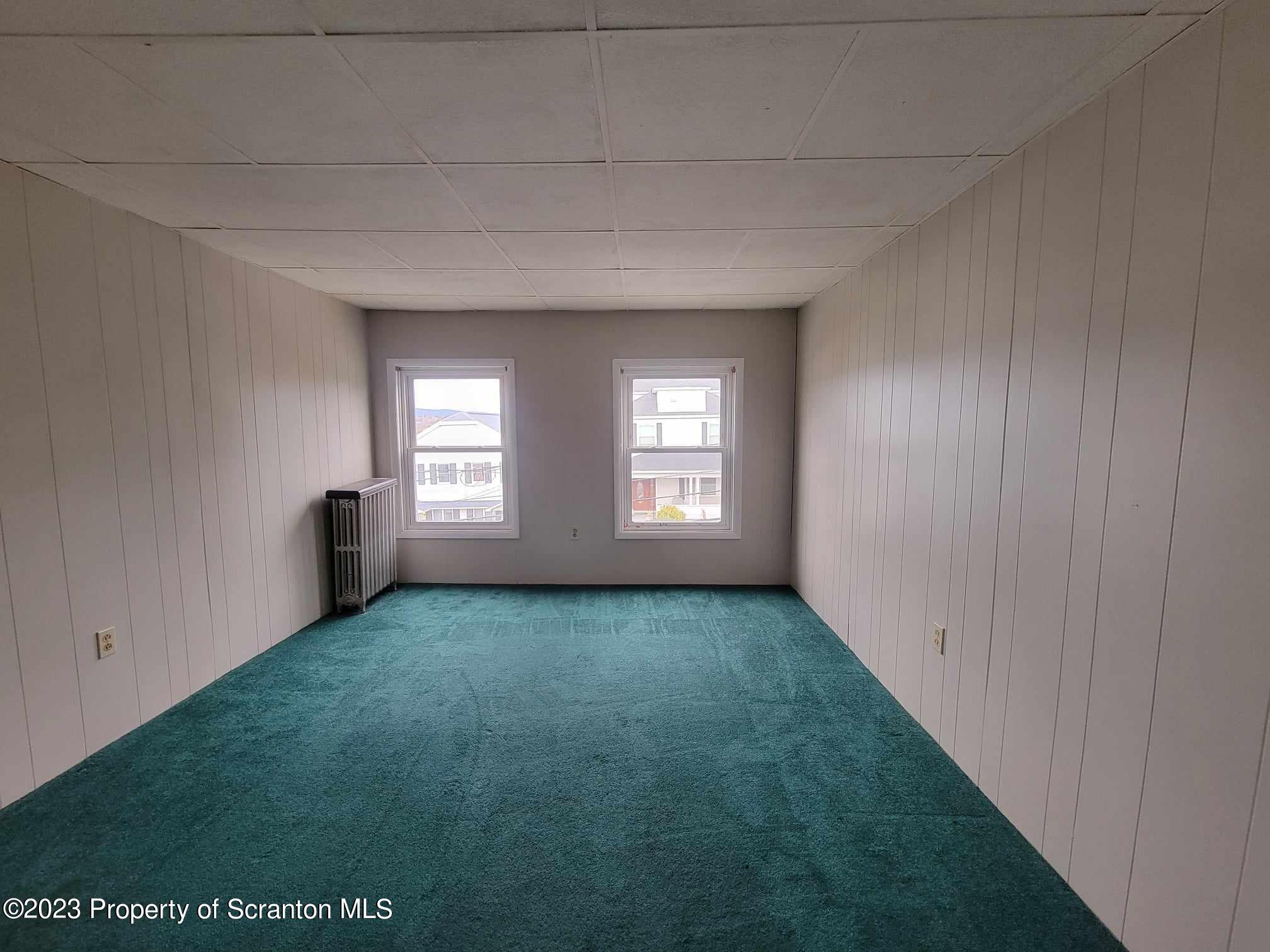 138 East Grove Street Taylor, PA 18517 - Photo 11 of 17 a view of a room with window