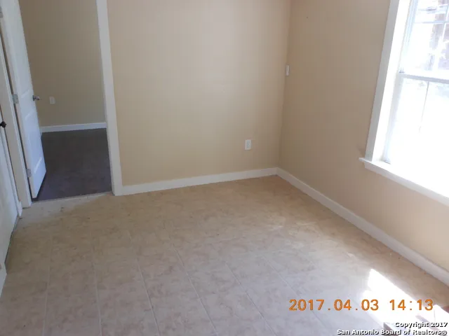 an empty room with a window