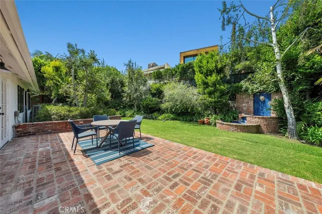 a view of a bench in a garden