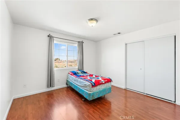 a room with toys and wooden floor